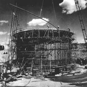 A black and white photo of construction work.